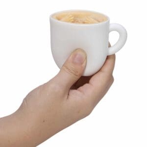 Pup in a Cup, squeezy Popper toy unsqueezed in hand before pup pops out
