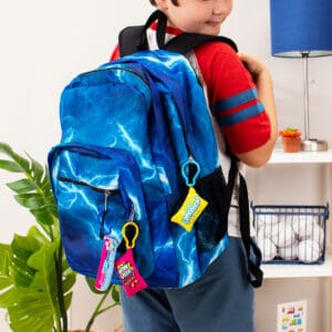 Lifestyle shot of SweetTarts Now and Later and Lemonhead Snacks on Snacks plush danglers on backpack